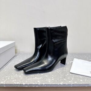 KHAITE Black Heeled Boots